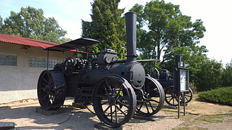 Vintage Black Steam Traction Engine in Outdoor Museum