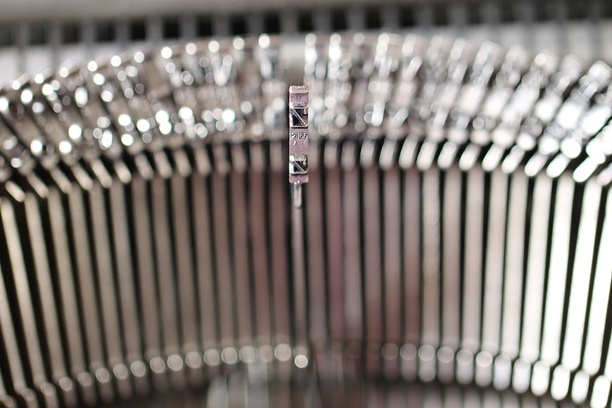 Close-up of vintage typewriter key mechanism