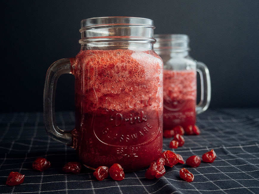 Cherry Smoothie in Mason Jar Mugs with Dried Fruit