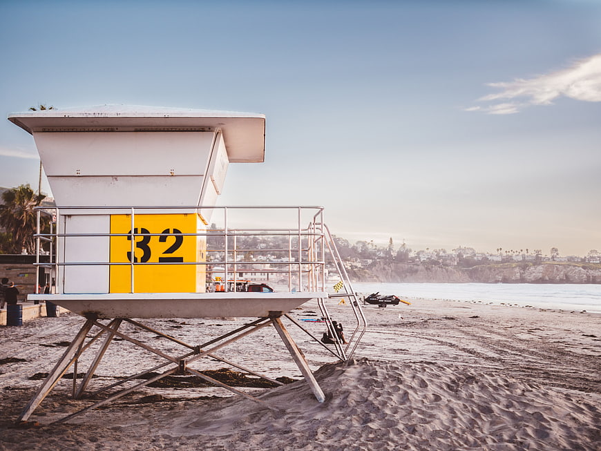 Yellow Lifeguard Tower 32 on Sandy Beach