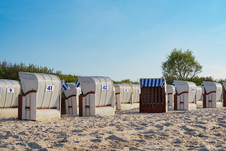 Traditional German Beach Chairs on Sandy Shore