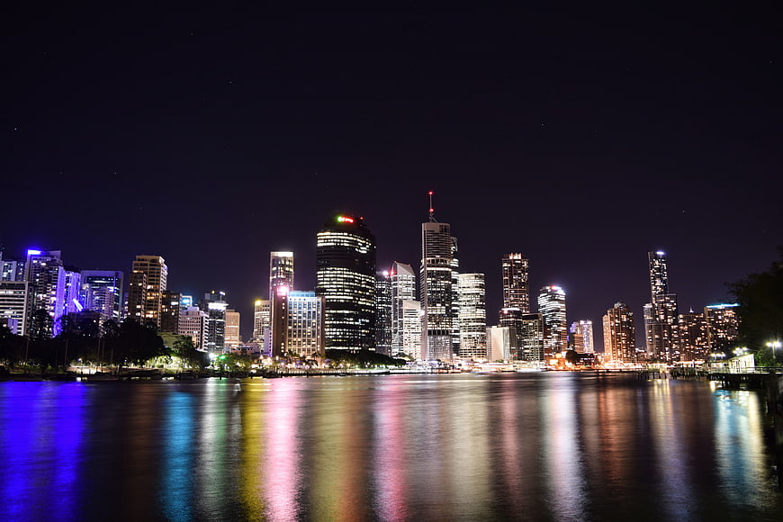 Night Skyline of Brisbane City Reflected in River Water