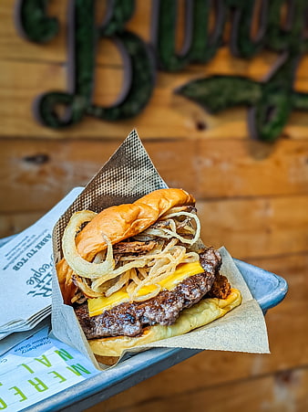 Cheeseburger with Fried Onions on Blue Tray