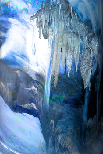 Abstract blue and white fluid art resembling ice cave stalactites