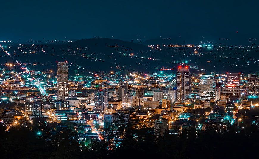 Nighttime Cityscape of Portland Oregon with Illuminated Skyscrapers