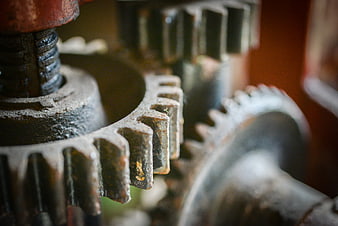 Close-up of rusty industrial gears and machinery parts