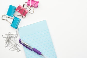Colorful Office Supplies Flat Lay on White Background