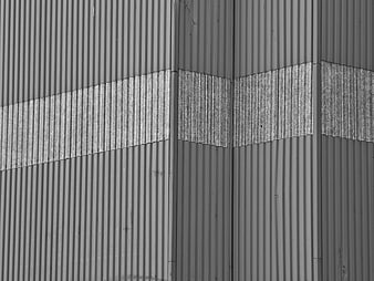 Abstract black and white corrugated metal wall texture
