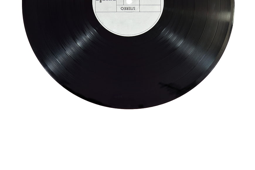 Partial View Of Black Vinyl Record On White Background