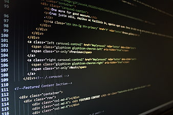 Close-up of HTML code on a computer monitor screen