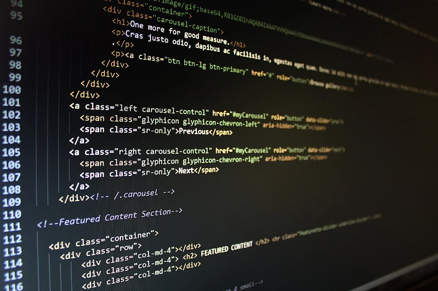 Close-up of HTML code on a computer monitor screen