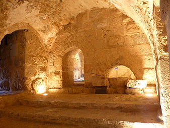 Ancient stone arches in Ajloun Castle, Jordan