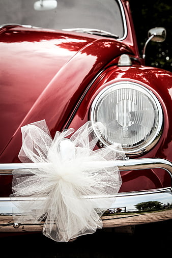 Red Vintage Car Front With White Wedding Tulle Bow