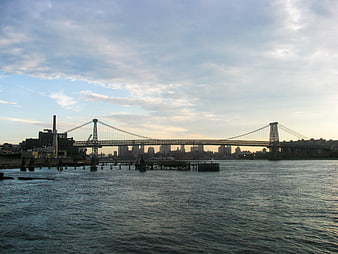 Williamsburg Bridge and Industrial Skyline at Dusk