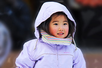 Cute Asian Girl in Purple Winter Jacket with Hood