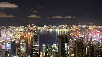 Hong Kong skyline at night with Victoria Harbour reflections