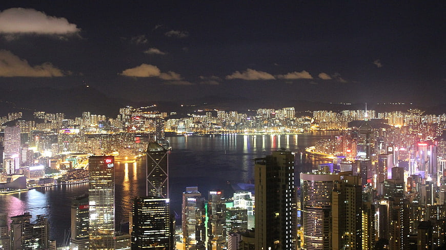 Hong Kong skyline at night with Victoria Harbour reflections