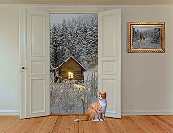 Surreal ginger cat sitting by open door to snowy forest