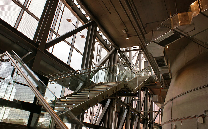 Low Angle View of Modern Industrial Staircase with Glass Railing