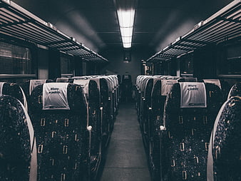 Empty Train Carriage Interior with Aisle and Seats