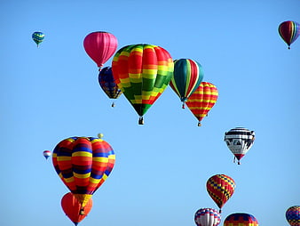 Colorful Hot Air Balloons Flying in Blue Sky