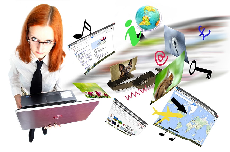 Woman with laptop and floating digital media icons