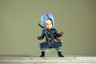 Chibi Anime Warrior Figurine With Blue Hair And Sword