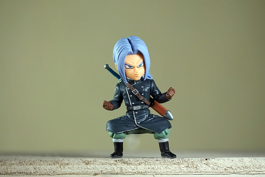 Chibi Anime Warrior Figurine With Blue Hair And Sword