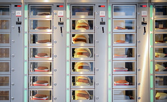 Vending machine filled with burgers and fried food