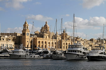 Luxury yachts docked in Valletta Grand Harbour Malta