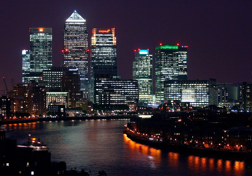 London Canary Wharf Skyline at Night with River Reflections