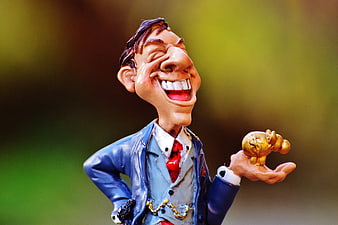 Caricature Businessman Figurine Holding Gold Coin Against Blurred Green Background