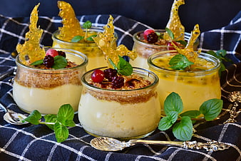 Gourmet Passion Fruit Panna Cotta Desserts With Berries And Caramel