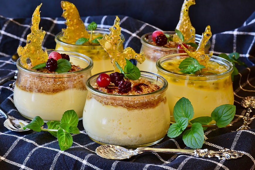 Gourmet Passion Fruit Panna Cotta Desserts With Berries And Caramel