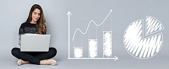 Woman with laptop and hand-drawn business growth charts
