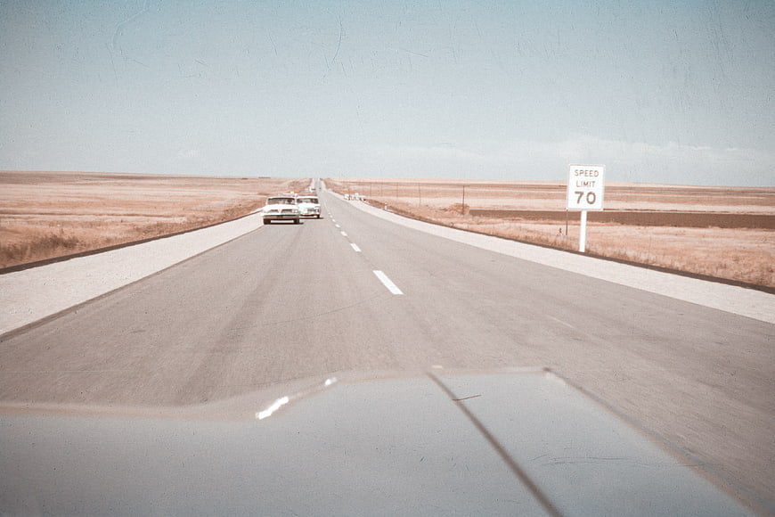 Vintage POV Highway Drive Through Flat American Landscape