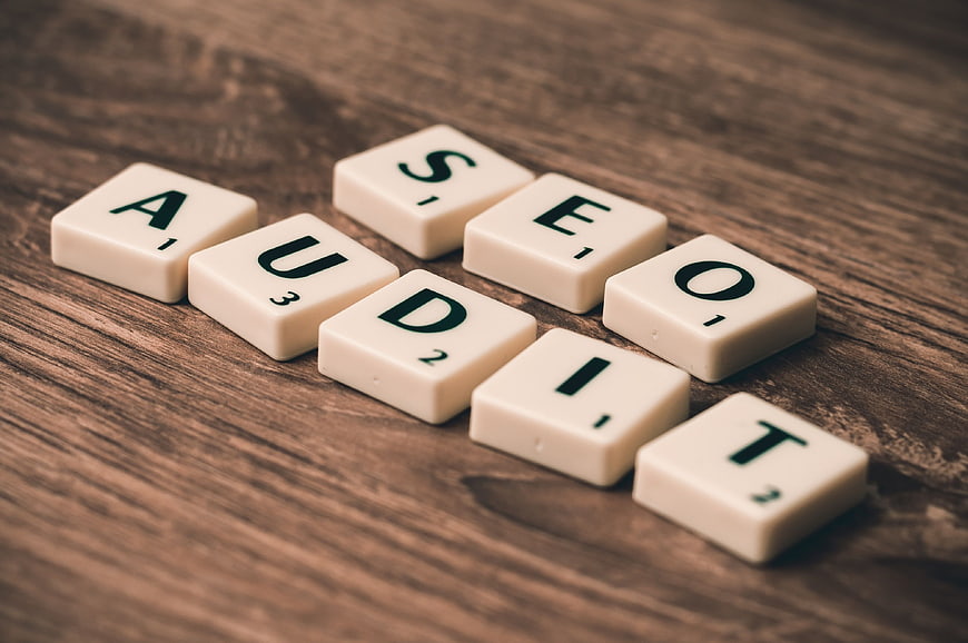 SEO Audit Scrabble Tiles on Wooden Background