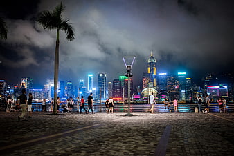 Hong Kong Victoria Harbour Night Skyline with Pedestrians