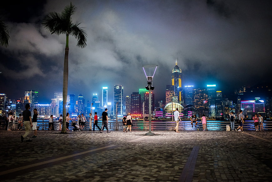 Hong Kong Victoria Harbour Night Skyline with Pedestrians