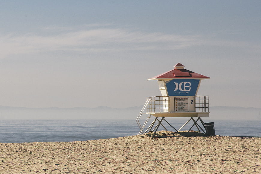 Lone Lifeguard Tower on Sandy Beach with Ocean View