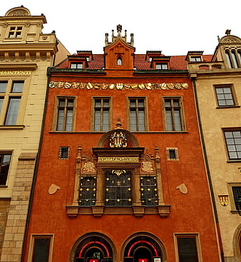 Historic Orange Renaissance Building Facade in Prague