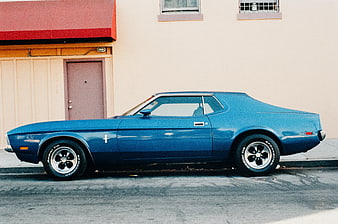 Side Profile of Classic Blue Ford Mustang Mach 1