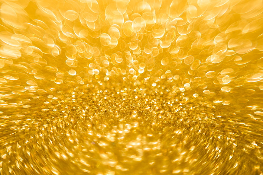 Abstract Golden Bokeh Background with Shimmering Light