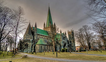 Nidaros Cathedral in Trondheim, Norway, Under Dramatic Overcast Sky