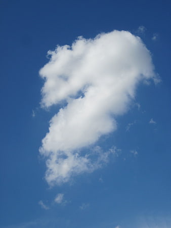 White Cloud Against Deep Blue Sky