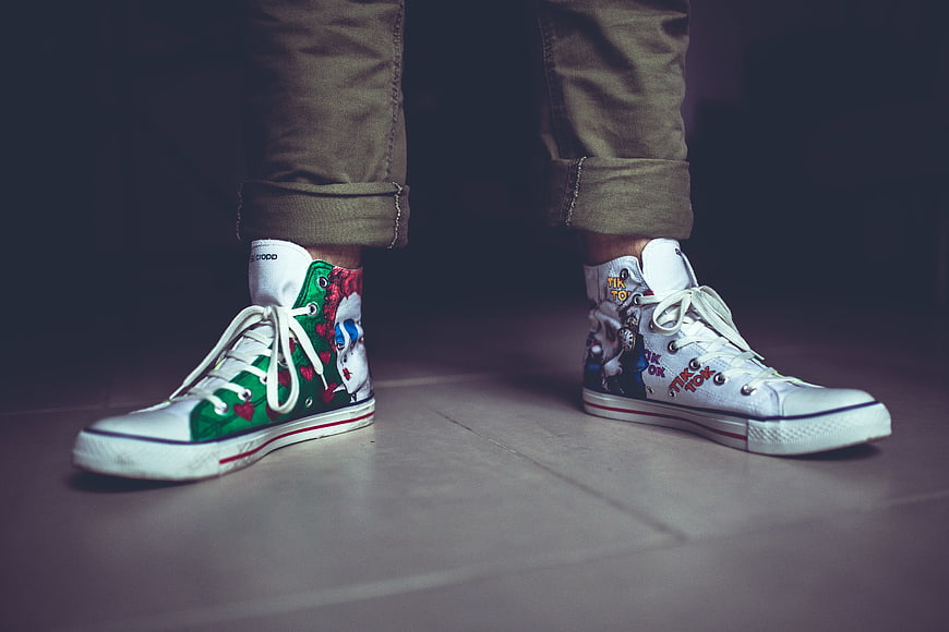 Custom hand-painted high-top sneakers with pop art designs