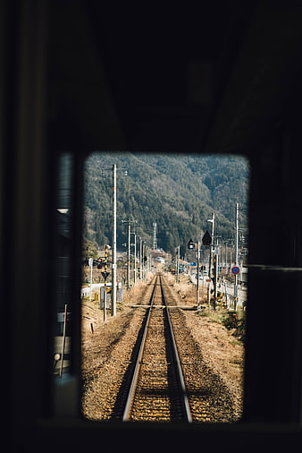 Train Tracks View Through Tunnel Window
