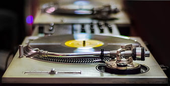 Close-up of vintage turntable playing vinyl record