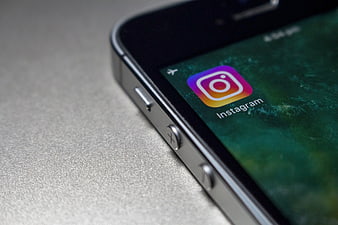 Close-up of Instagram App Icon on Smartphone Screen