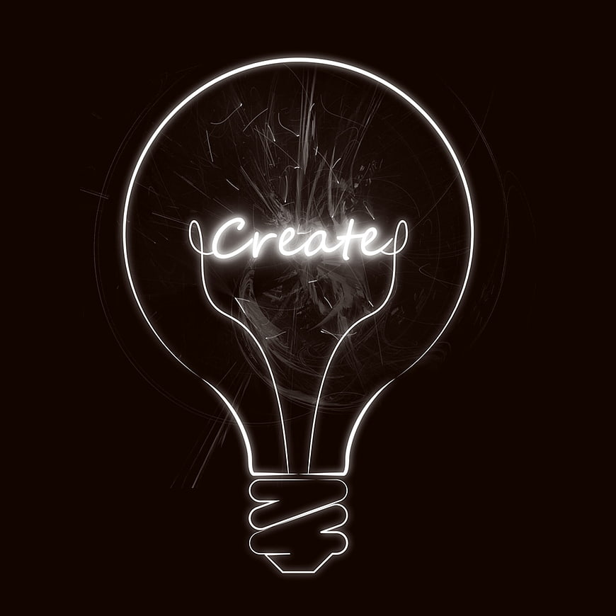 Neon lightbulb with word Create inside on black background